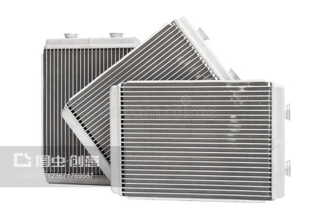 白色背景上的三个新的汽车散热器炉子Three new automotive radiator stove on a white background